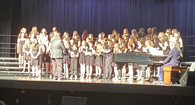 MS choir performance on the HS stage  